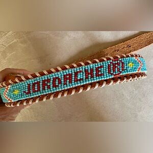 Leather beaded and stitched tribal belt Jordache. Small 
See photos.